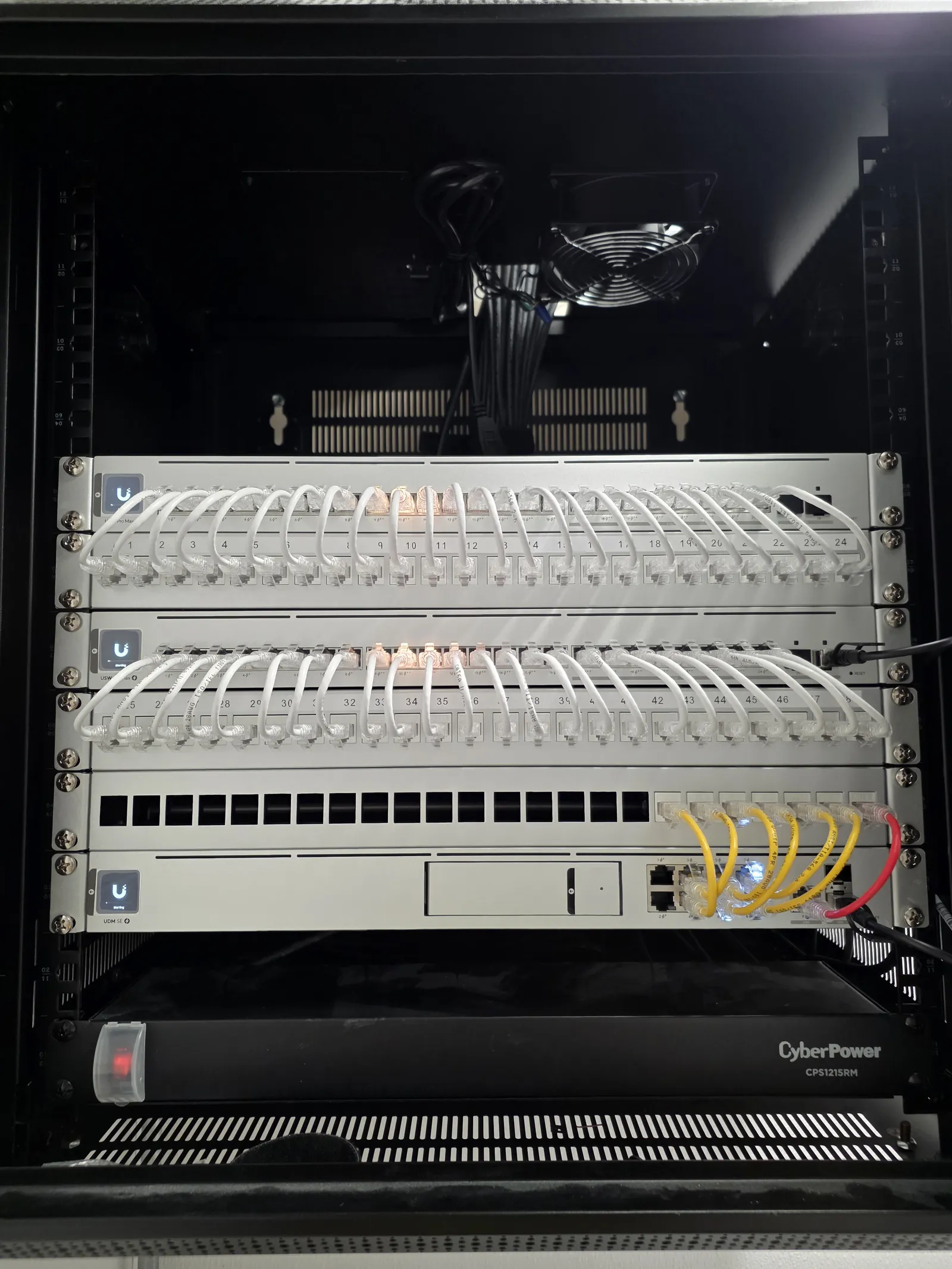 Network rack with patch panel and UPS installed by INTEK at a West Des Moines medical clinic